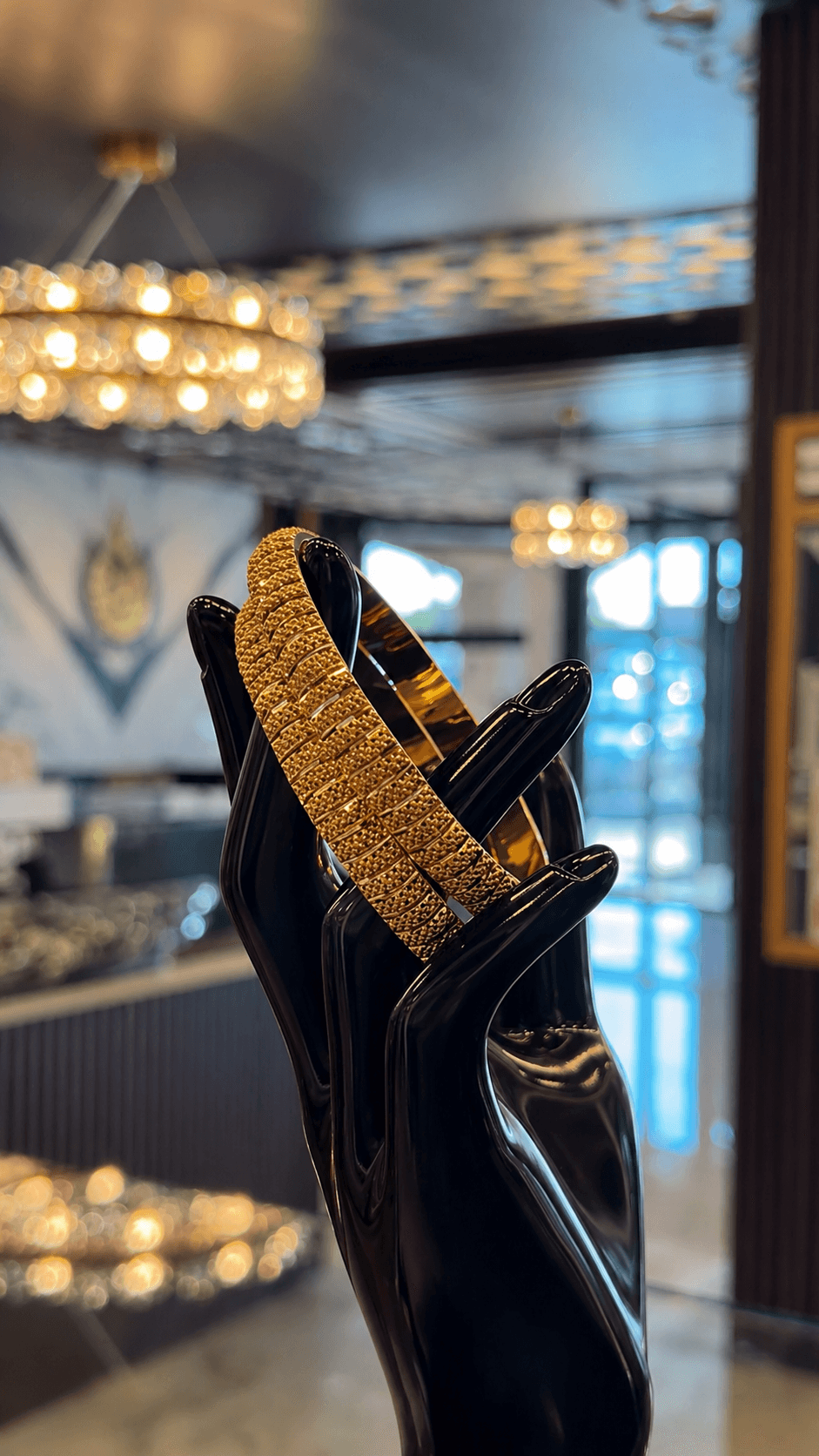 Turmusaya Jewelry storefront — pure gold pieces displayed in Tampa